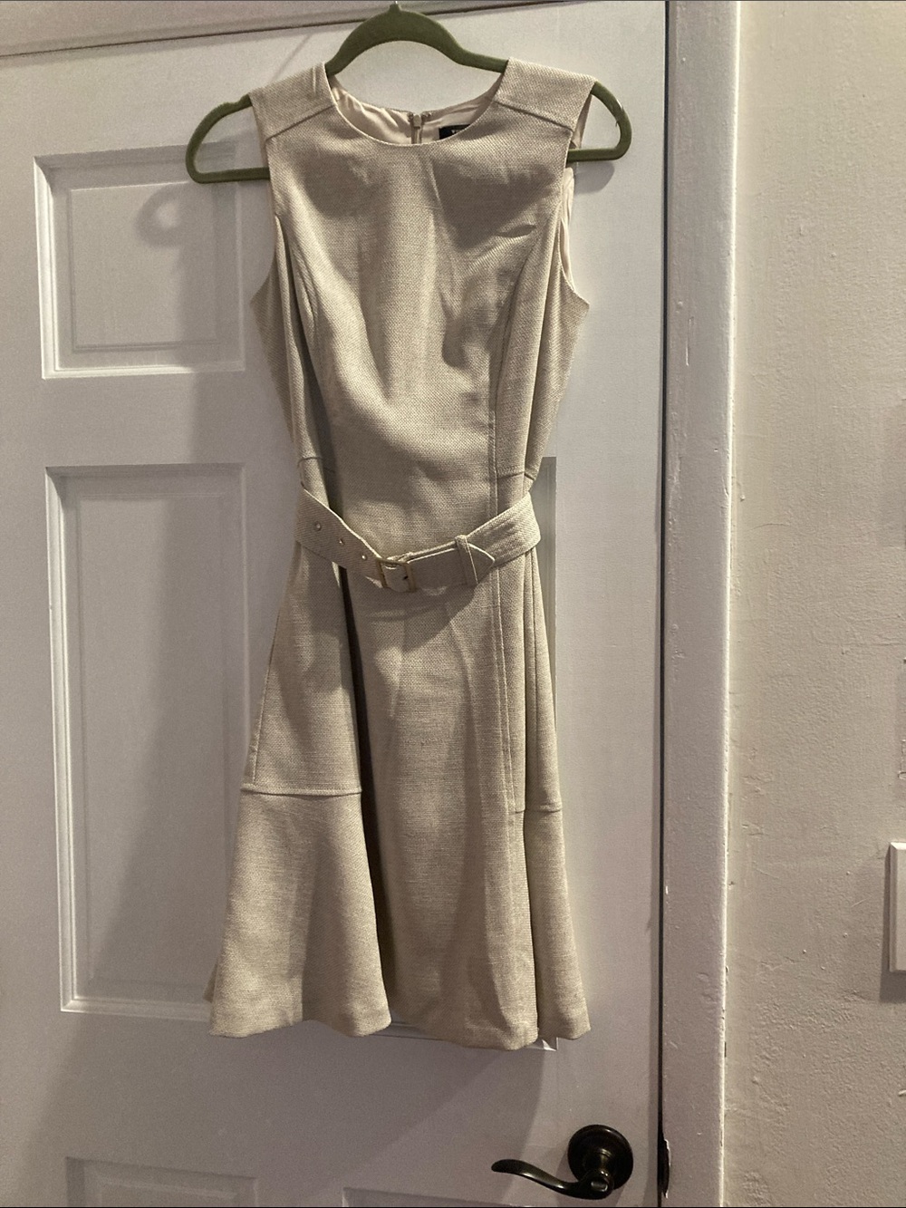 White House Black Market Sleeveless Cream Belted above the knee length.